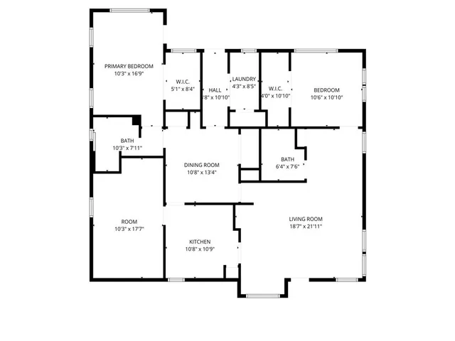 a picture of a bench in front of a wall