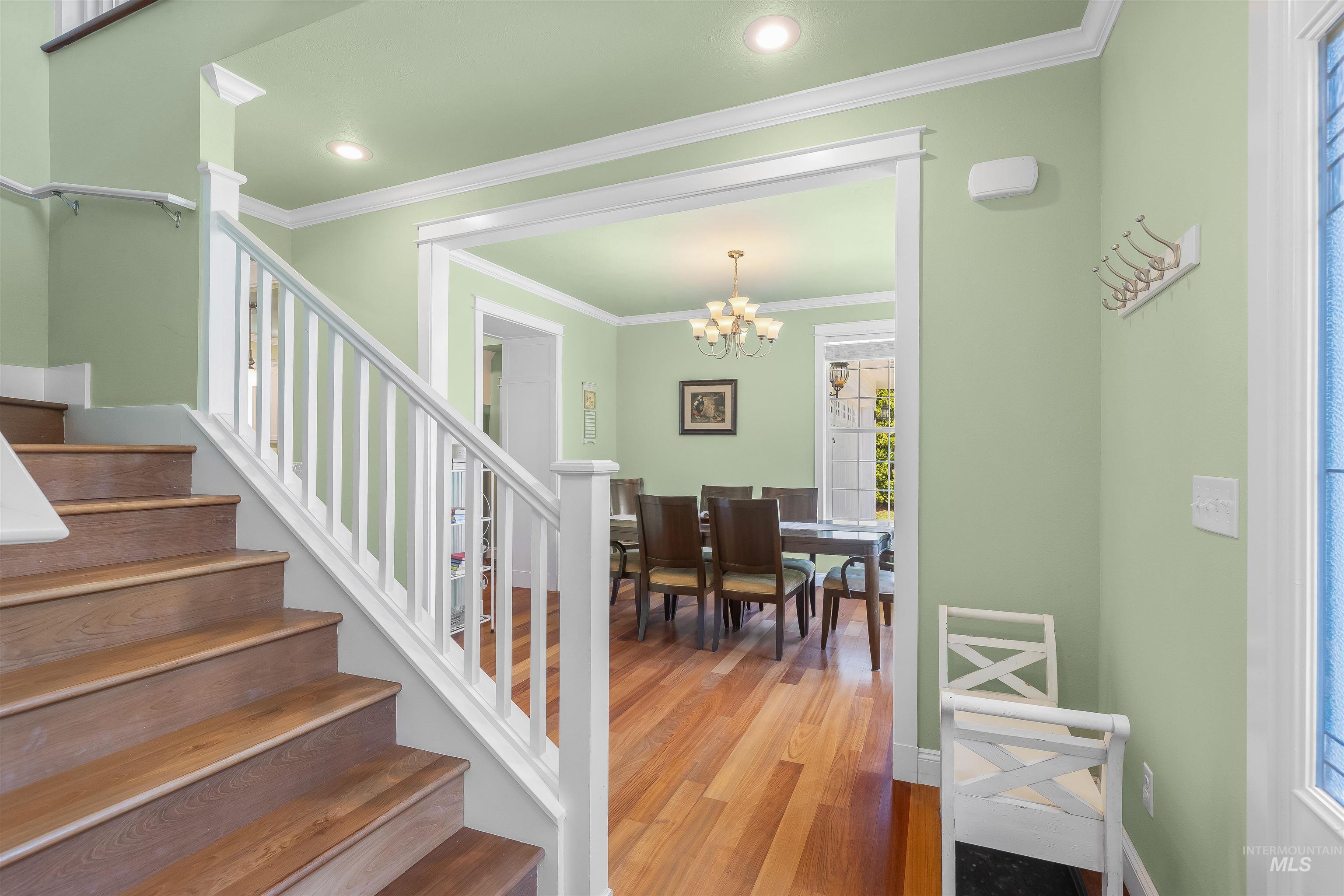 1617 Pine Cone Road Moscow, ID 83843 - Photo 6 of 44 Staircase with wood-finish treads and white balusters