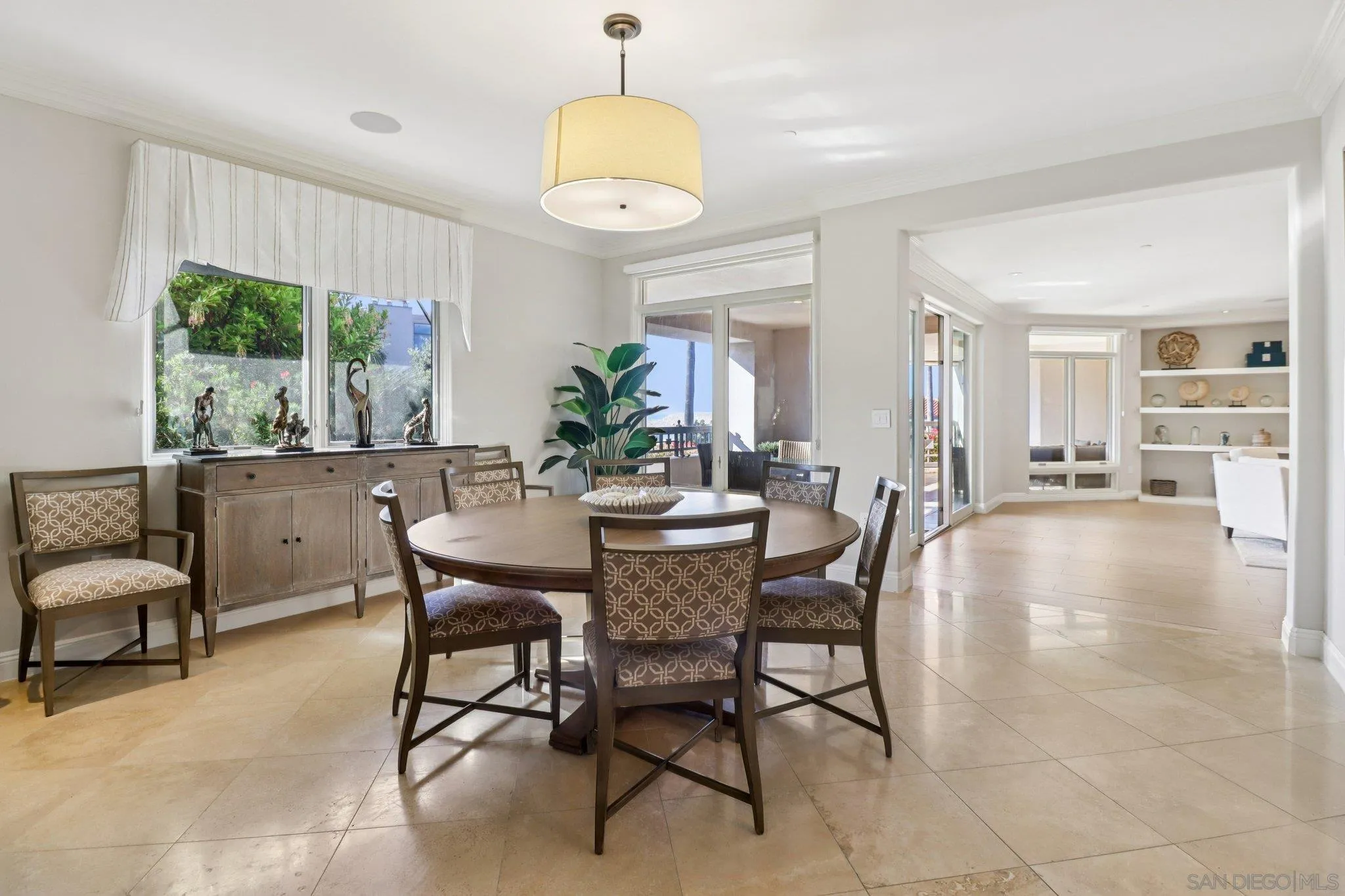 464 Prospect Street, Unit 101 La Jolla, CA 92037 - Photo 12 of 65 a view of a dining room with furniture window and outside view