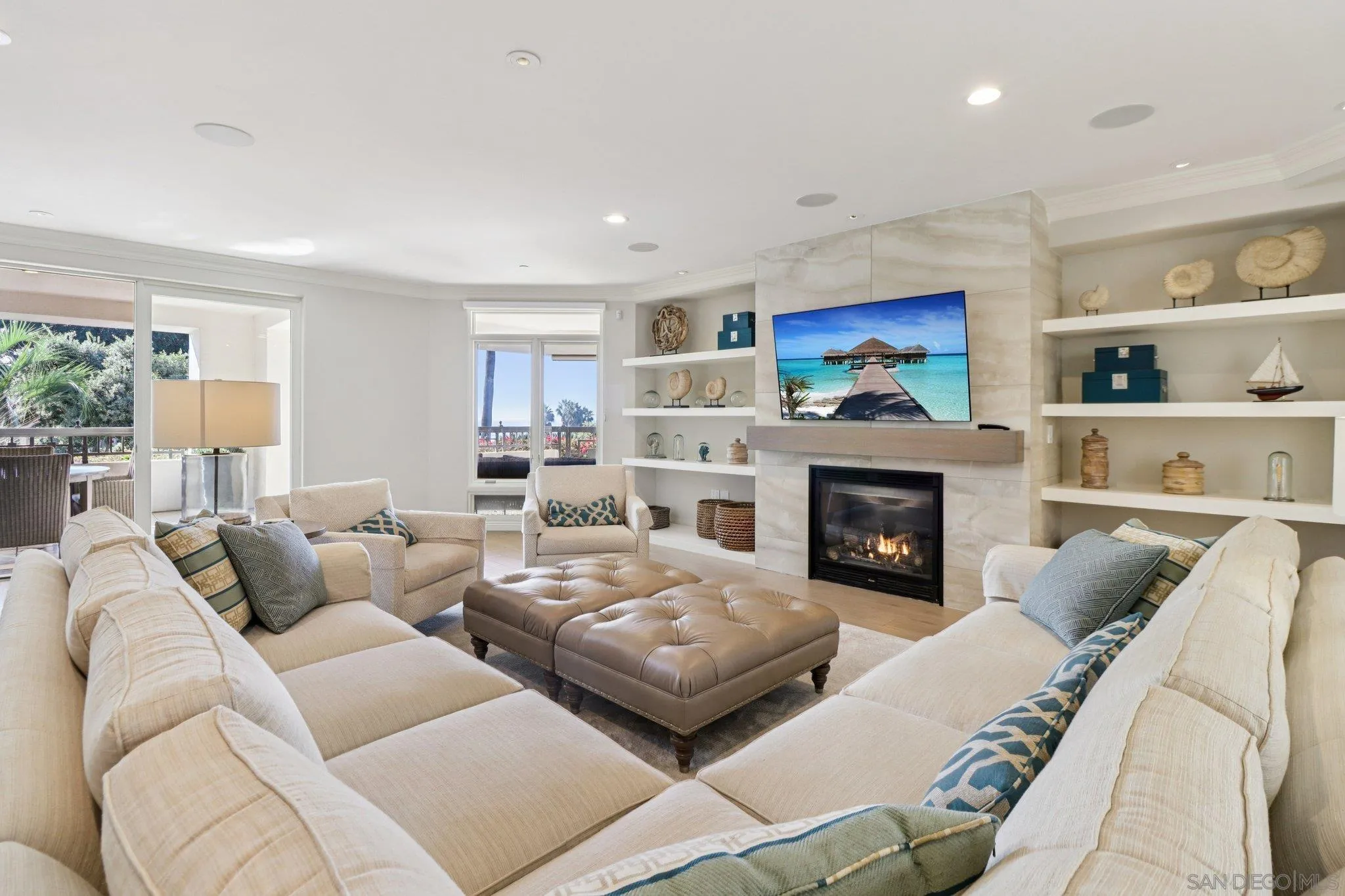 464 Prospect Street, Unit 101 La Jolla, CA 92037 - Photo 7 of 65 a living room with furniture and a fireplace