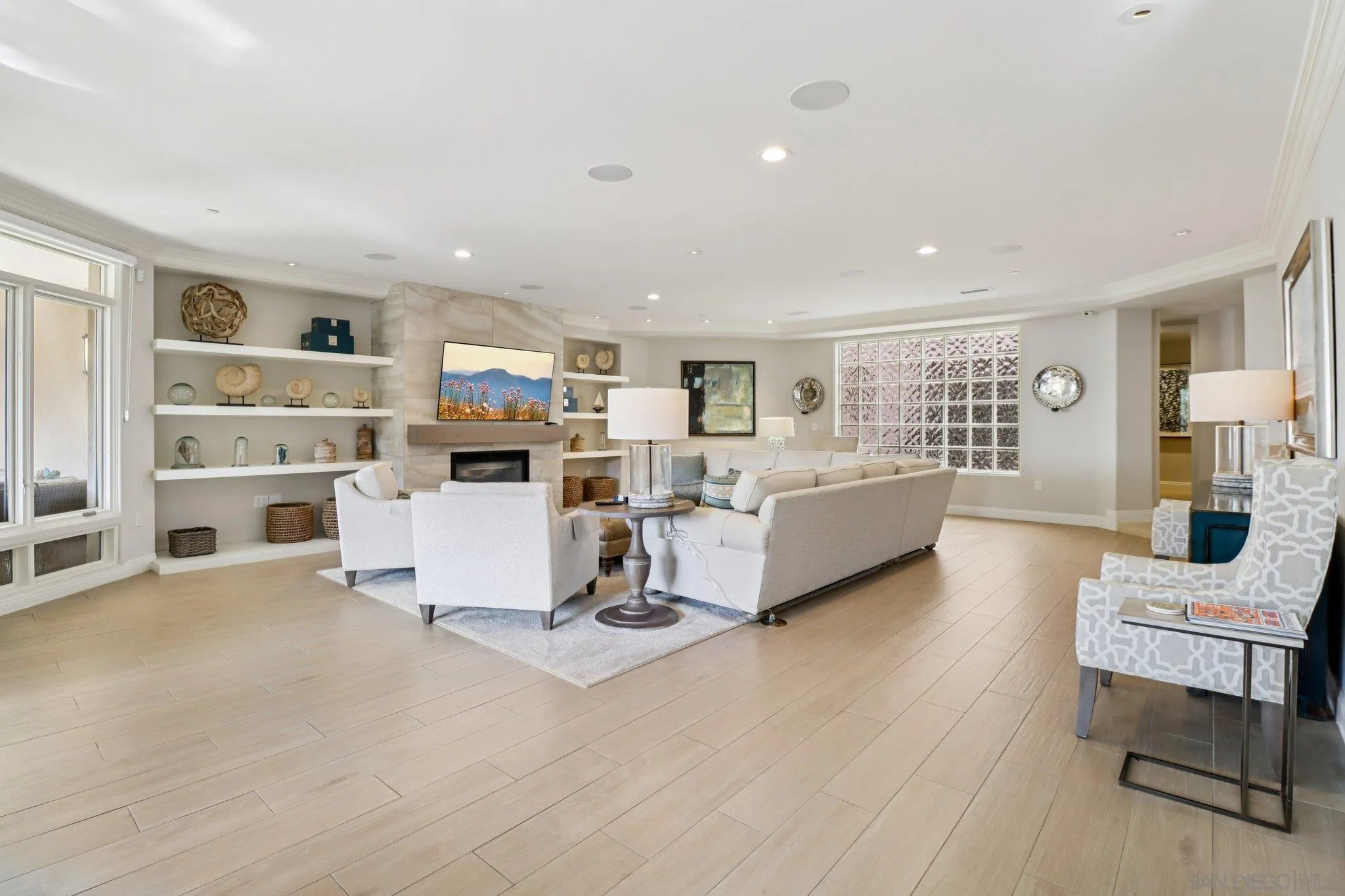 464 Prospect Street, Unit 101 La Jolla, CA 92037 - Photo 10 of 65 a living room with furniture and a table