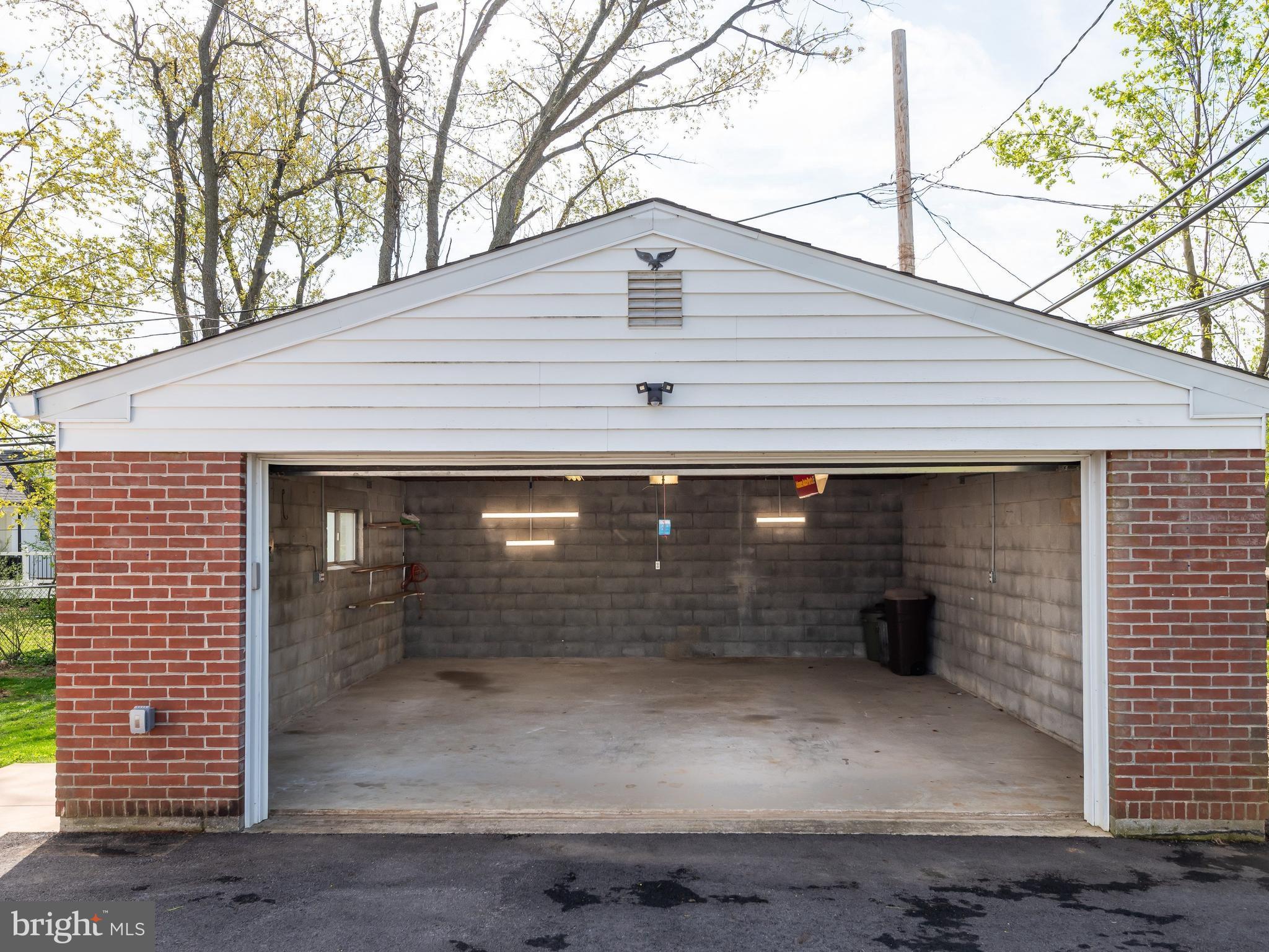 23 Pleasant Road Broomall, PA 19008 - Photo 31 of 36 a front view of a house with garage