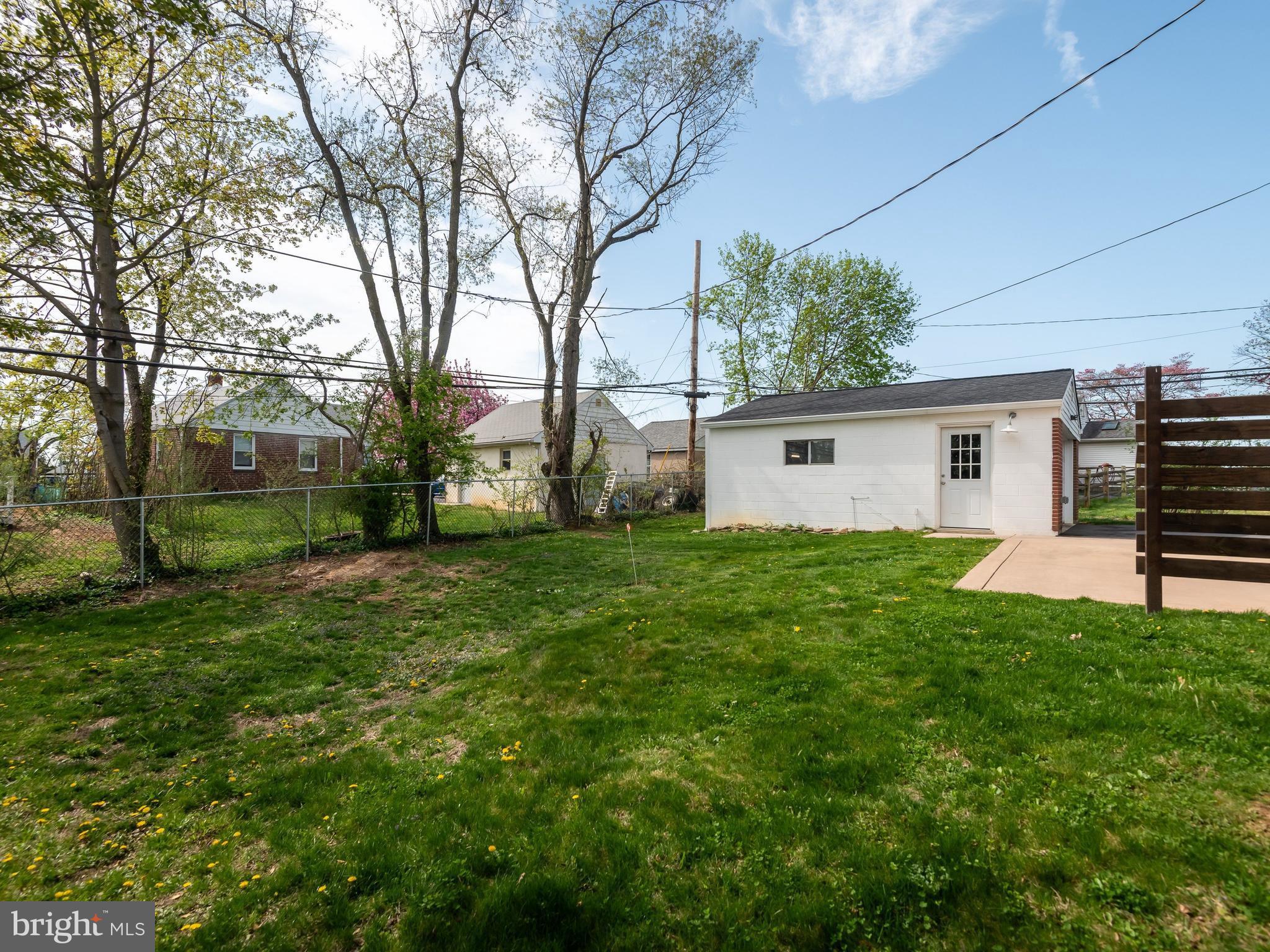 23 Pleasant Road Broomall, PA 19008 - Photo 36 of 36 a view of a house with backyard and a tree