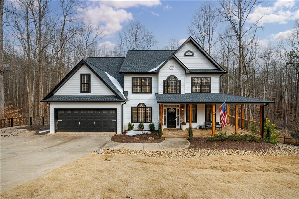 4049 Ashford Way Gainesville, GA 30507 - Photo 2 of 74 a front view of a house with a yard