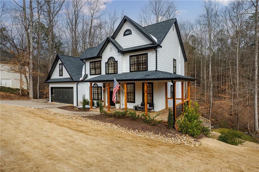 4049 Ashford Way Gainesville, GA 30507 - Photo 3 of 74 a front view of a house with a yard