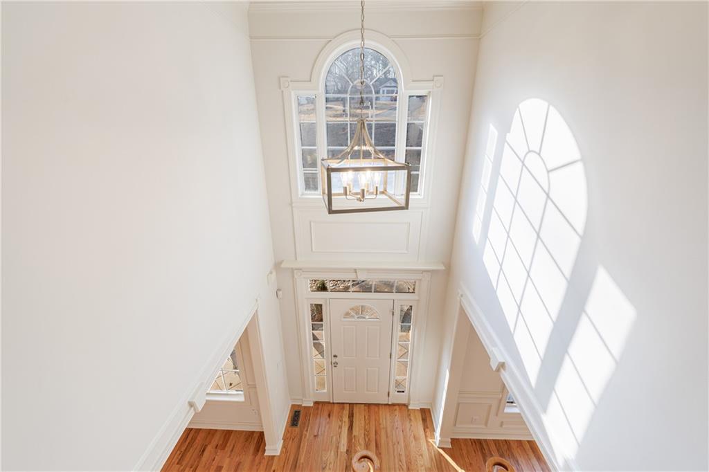 4049 Ashford Way Gainesville, GA 30507 - Photo 40 of 74 a view of a livingroom with wooden floor and a window