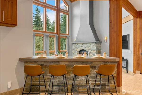 a view of a dining room with furniture window and outside view