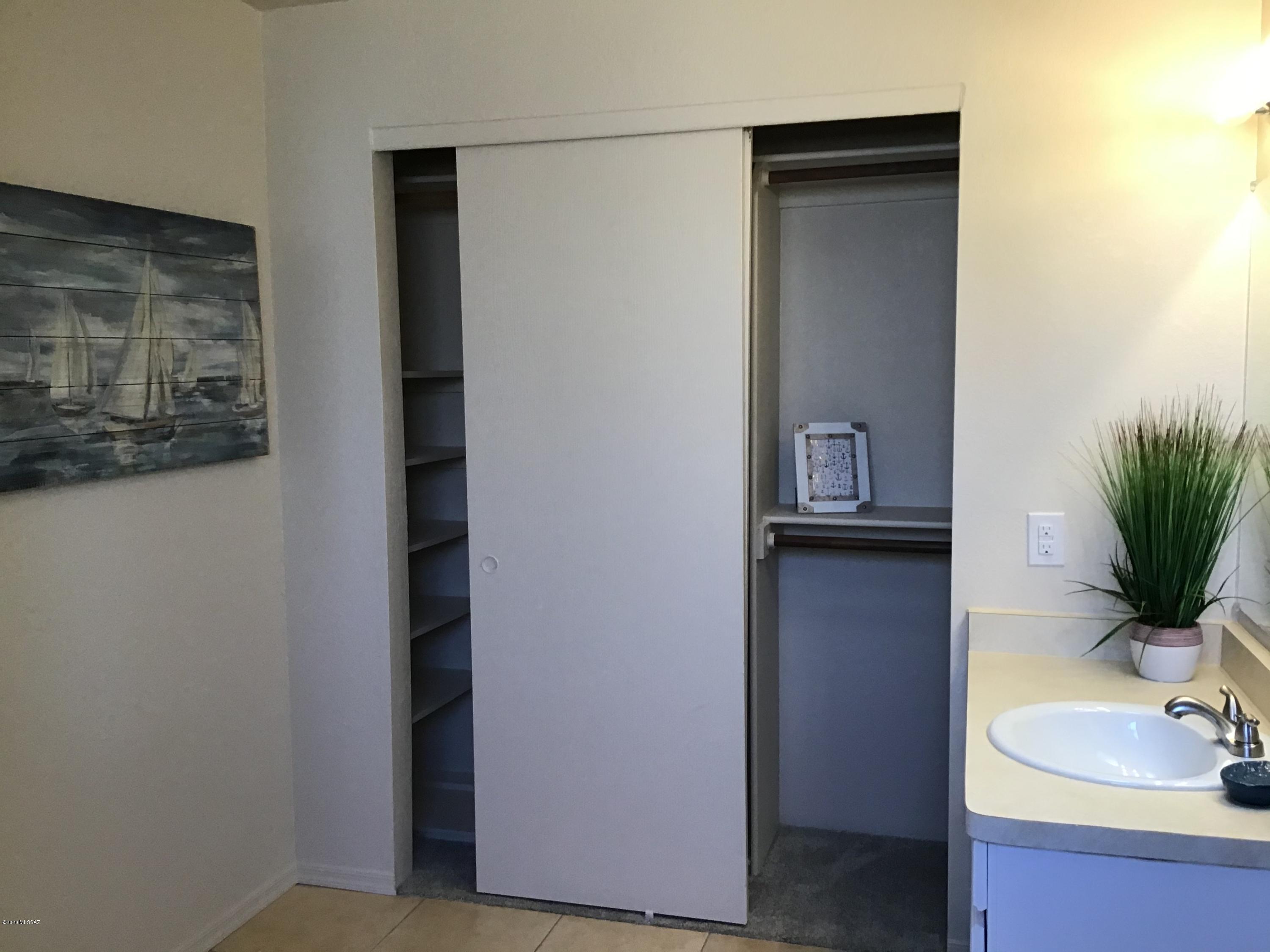 2560 West Firebrook Road Tucson, AZ 85741 - Photo 4 of 16 a view of bathroom with a toilet and a sink
