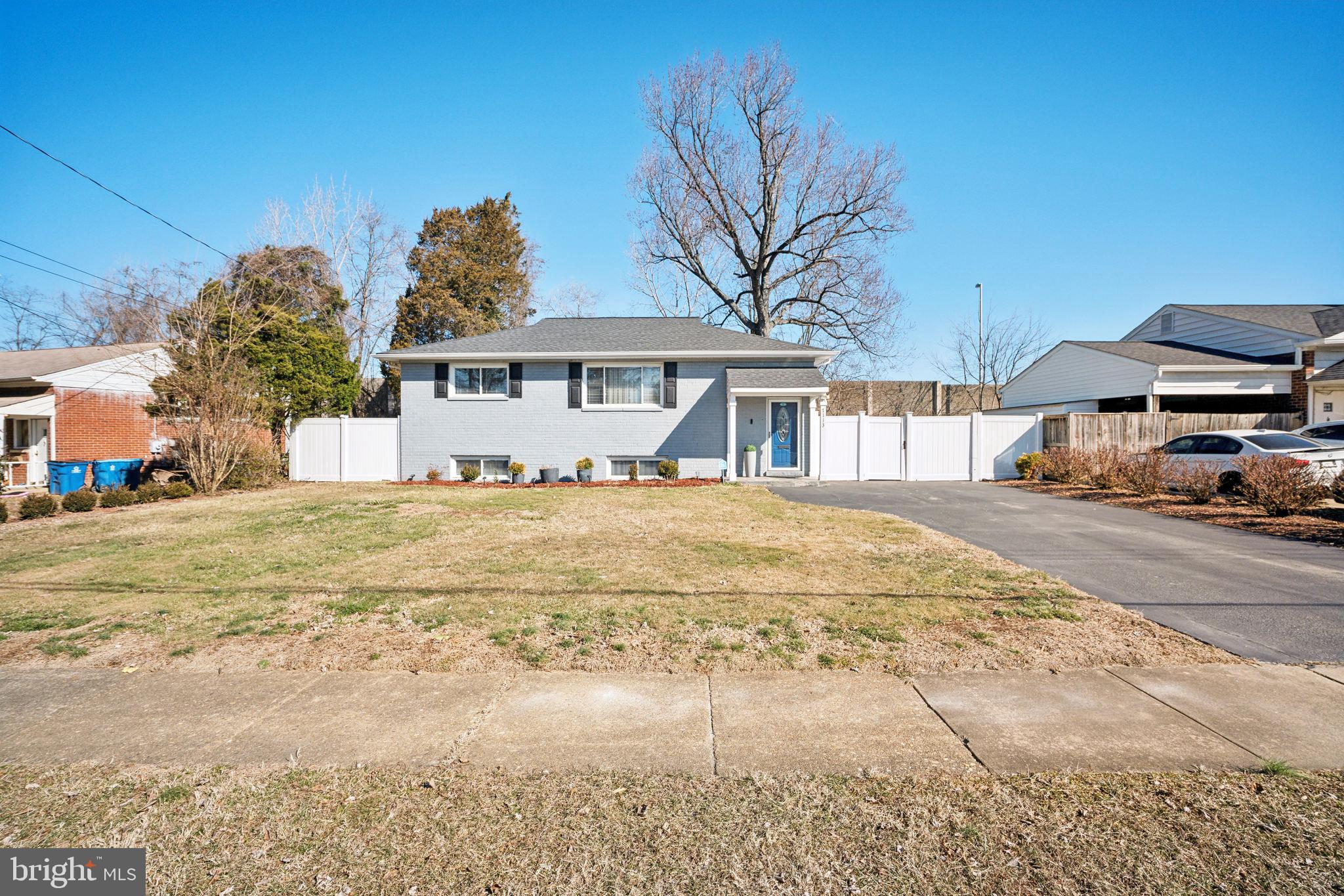 7113 Evanston Road Springfield, VA 22150 - Photo 1 of 30 a front view of a house with a yard
