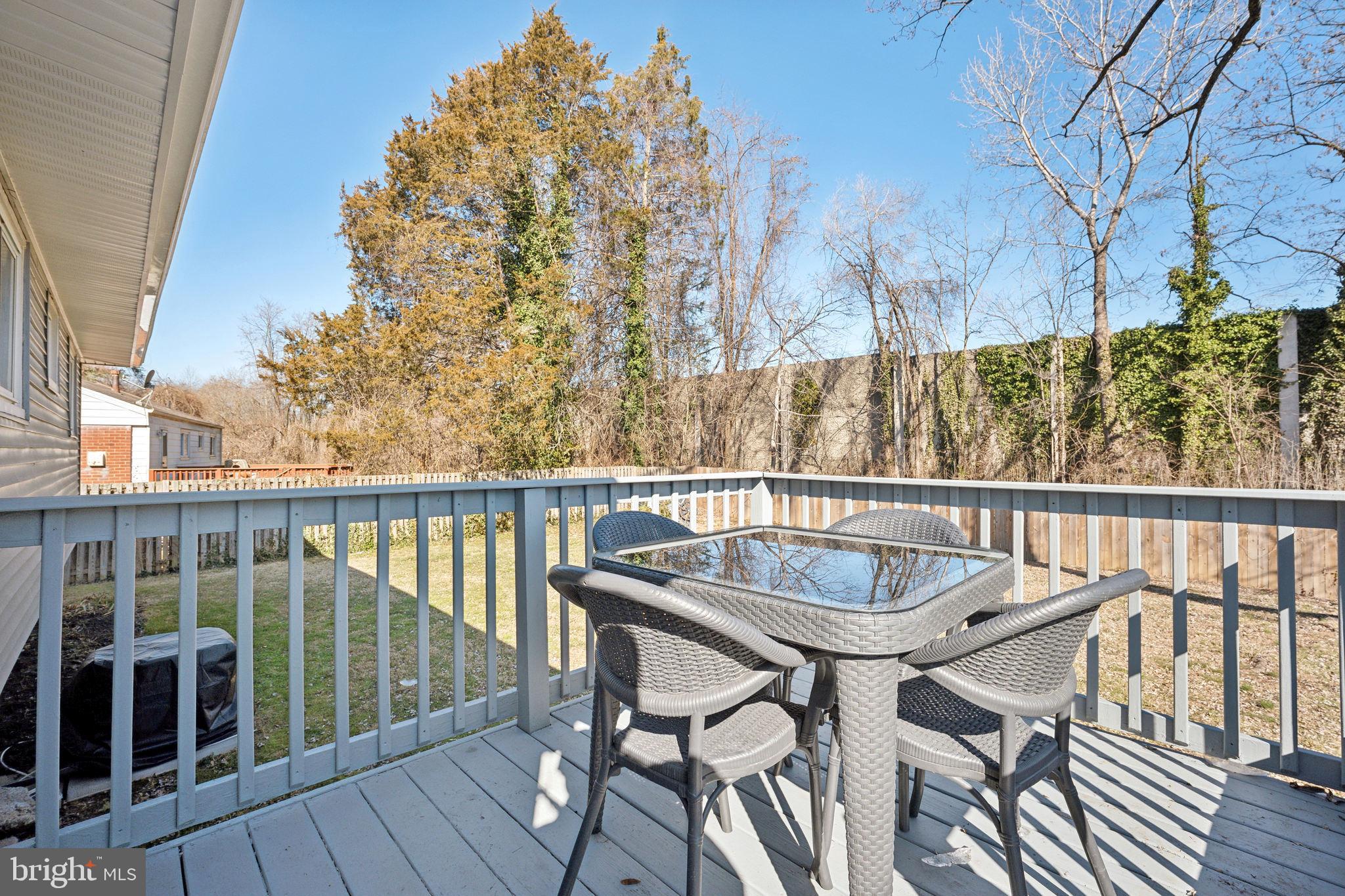 7113 Evanston Road Springfield, VA 22150 - Photo 14 of 30 a view of a balcony with furniture