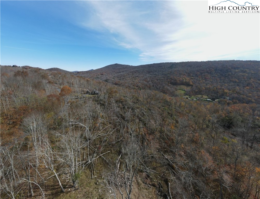 A18 Meadow Ave Loop Banner Elk, NC 28604 - Photo 19 of 19 a view of a dry yard with mountains in the background
