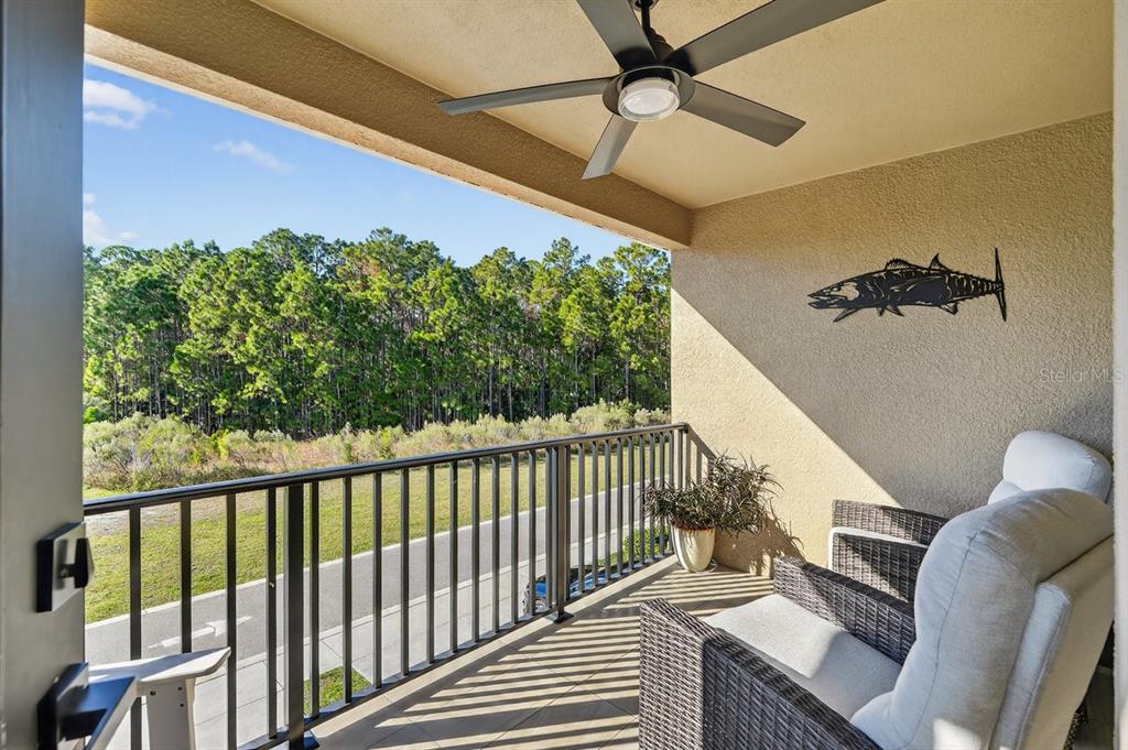 3417 Gallia Street New Smyrna Beach, FL 32168 - Photo 44 of 52 a view of balcony with wooden floor