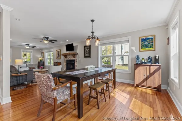 a bathroom with a granite countertop sink mirror and bathtub