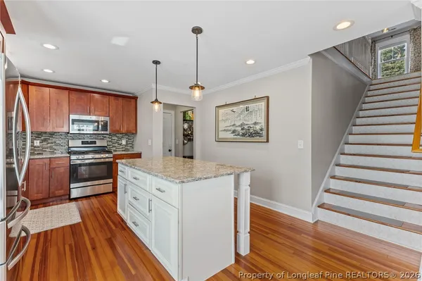 a bathroom with a double vanity sink a and a mirror