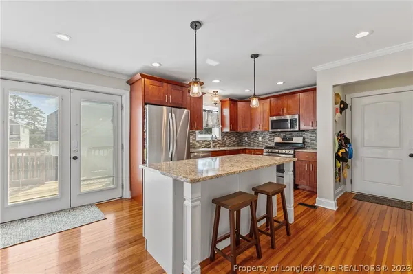a bathroom with a sink and mirror