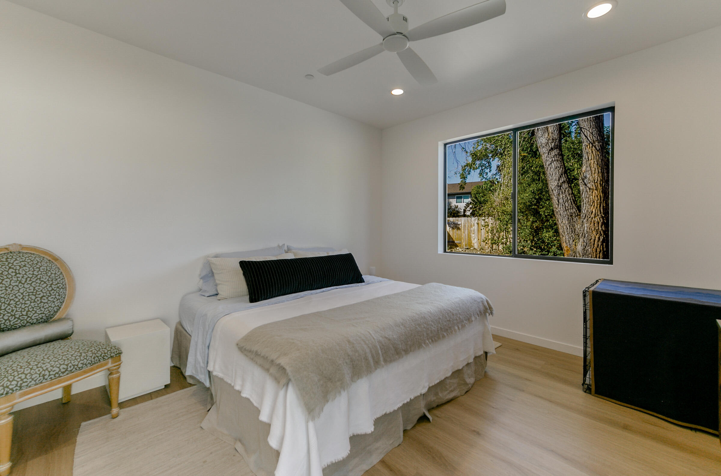 288 Tourmaline Way Redding, CA 96003 - Photo 19 of 46 a bedroom with a bed and a window