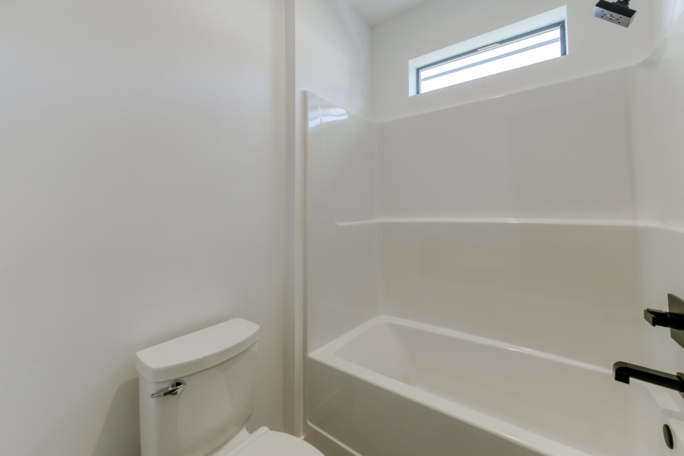 288 Tourmaline Way Redding, CA 96003 - Photo 33 of 46 a white bath tub sitting next to a white toilet
