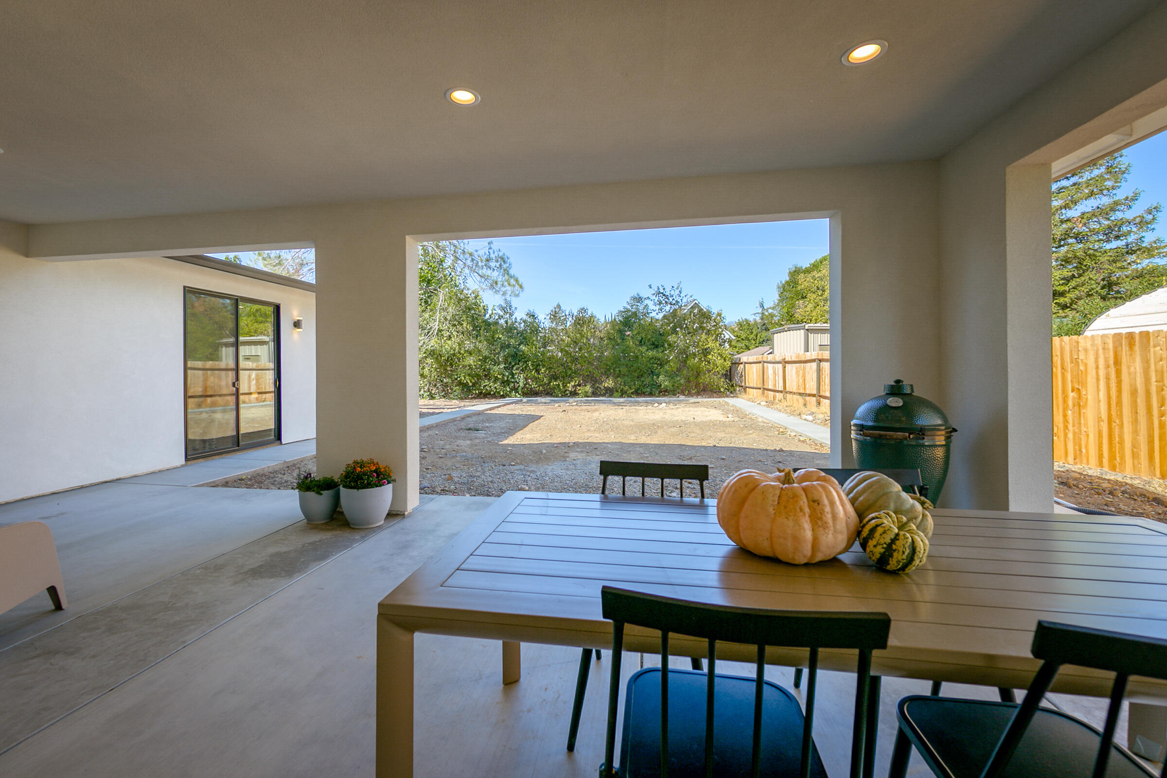 288 Tourmaline Way Redding, CA 96003 - Photo 36 of 46 a view of a dining room with furniture and wooden floor