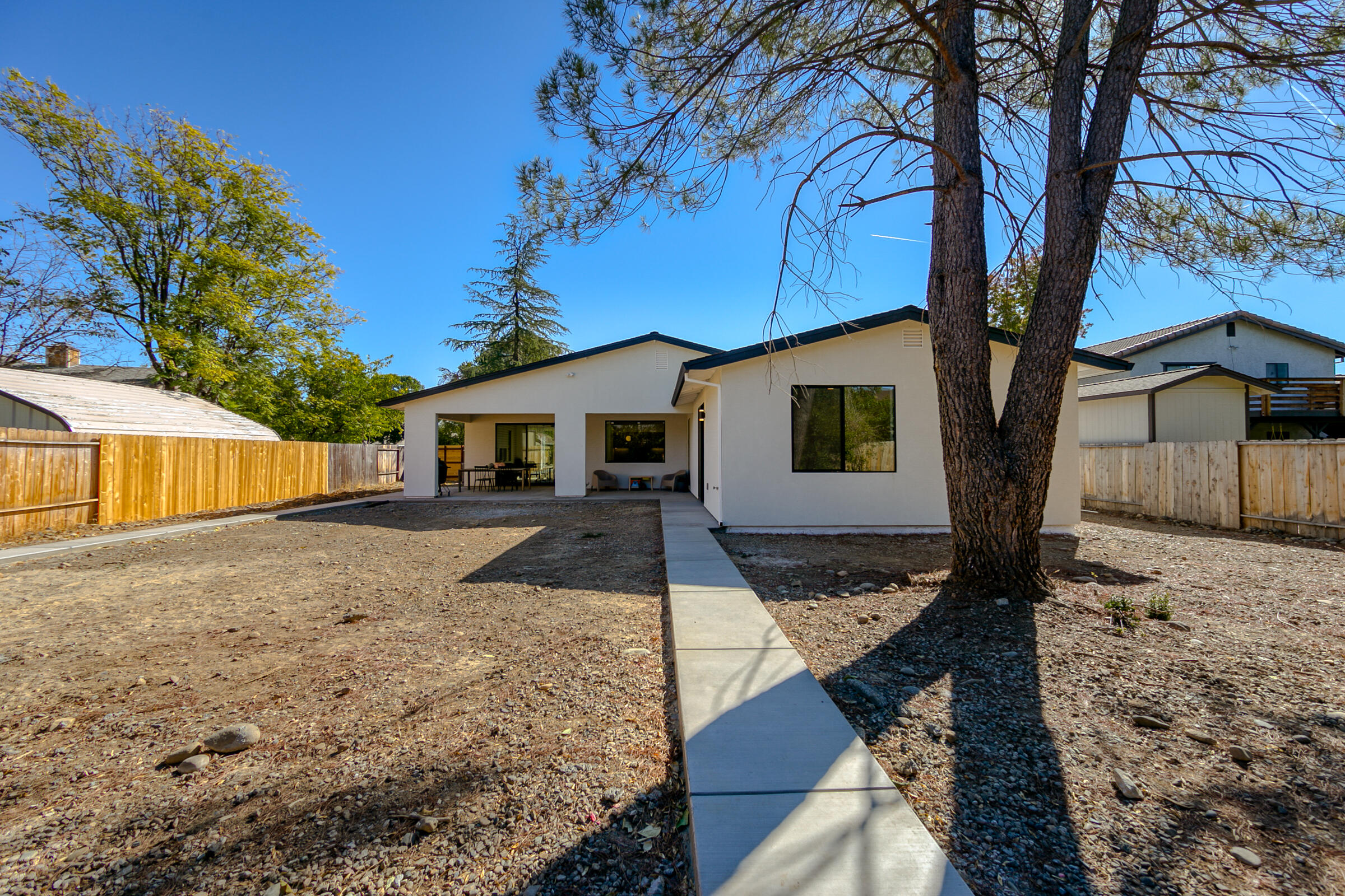 288 Tourmaline Way Redding, CA 96003 - Photo 39 of 46 a front view of a house with garden