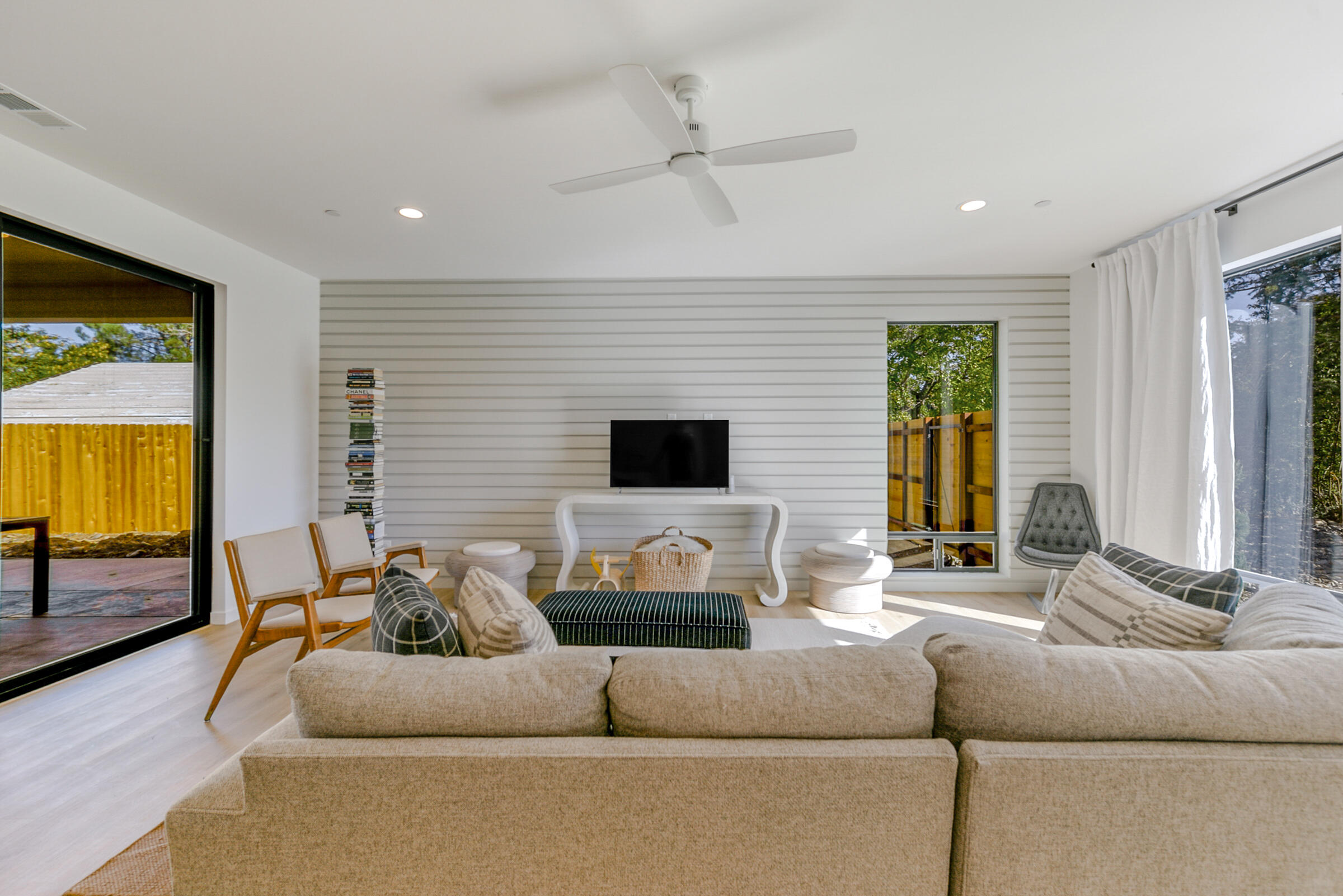 288 Tourmaline Way Redding, CA 96003 - Photo 5 of 46 a living room with furniture and a flat screen tv