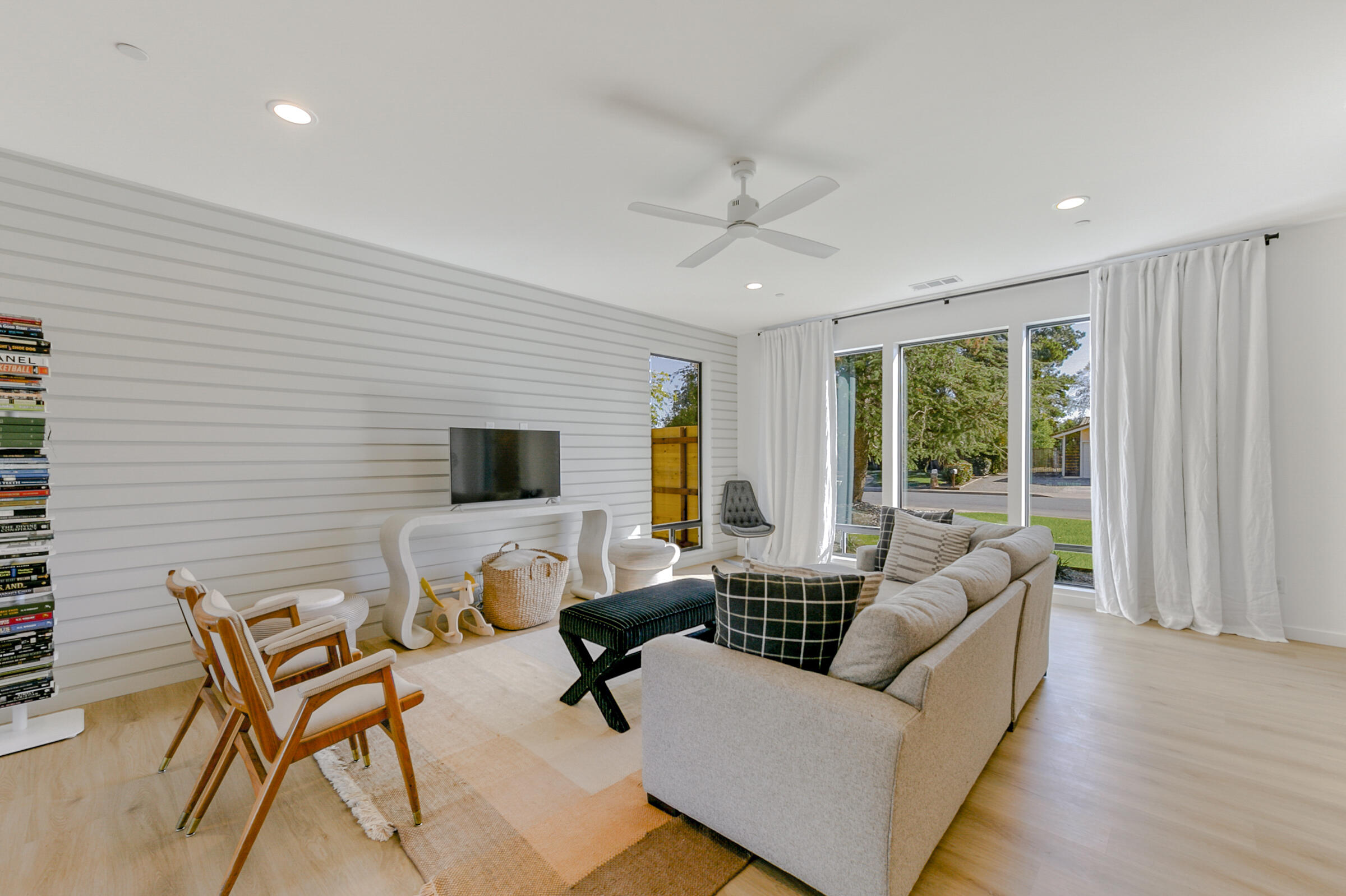 288 Tourmaline Way Redding, CA 96003 - Photo 6 of 46 a living room with furniture and a flat screen tv