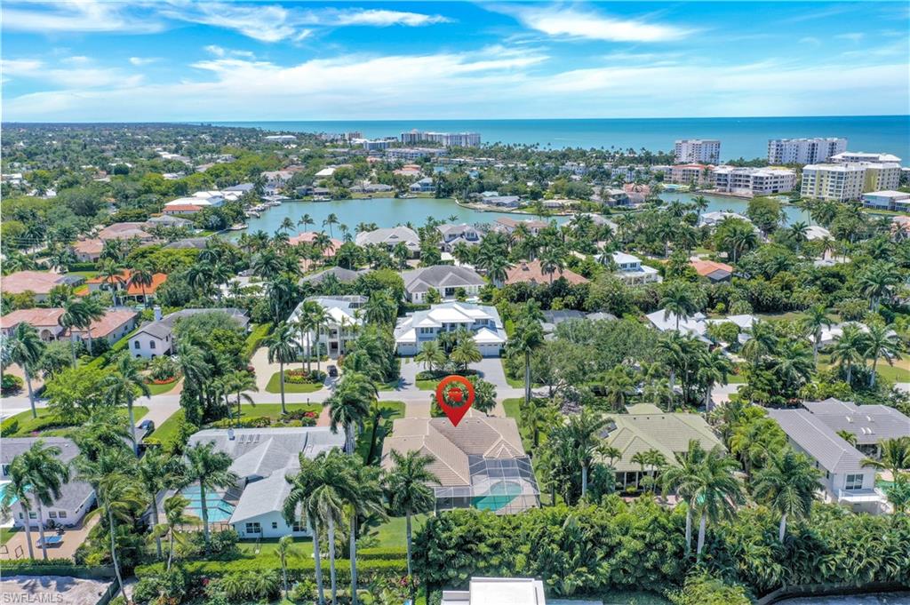 425 Rudder Road Naples, FL 34102 - Photo 3 of 31 an aerial view of city and green space