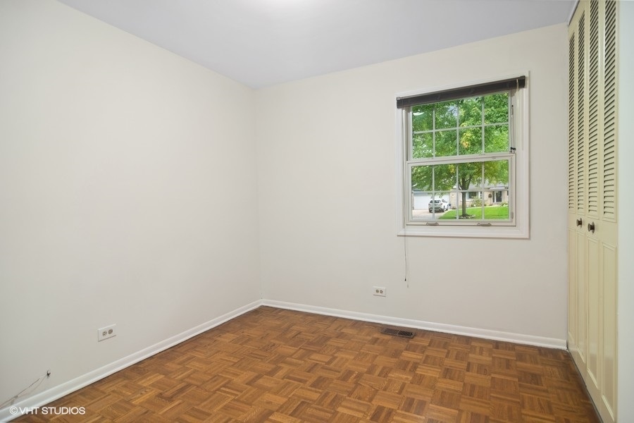 517 North Rohlwing Road Palatine, IL 60074 - Photo 13 of 17 an empty room with a window