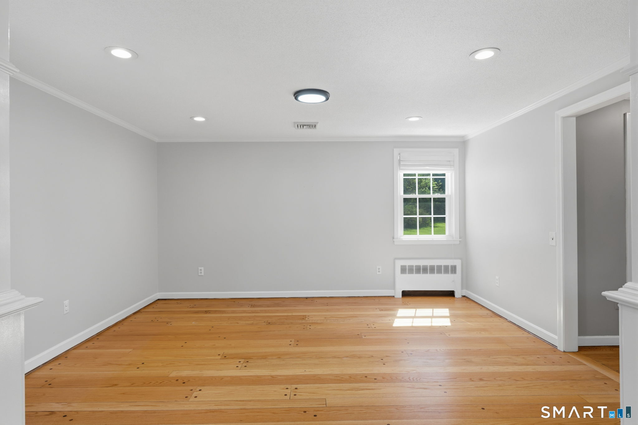 32 Meadowgate Street Wethersfield, CT 06109 - Photo 12 of 40 a view of empty room with wooden floor