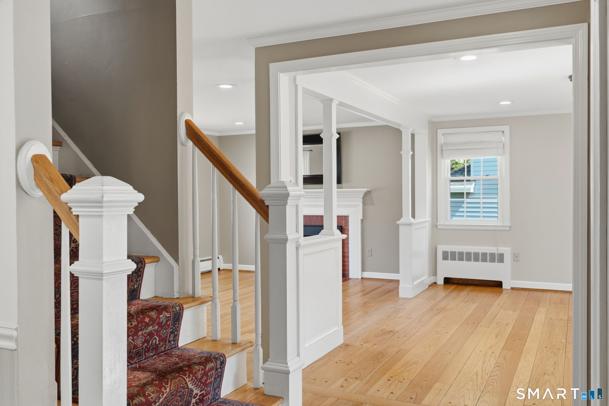 32 Meadowgate Street Wethersfield, CT 06109 - Photo 21 of 40 a view of entryway with wooden floor and stairs