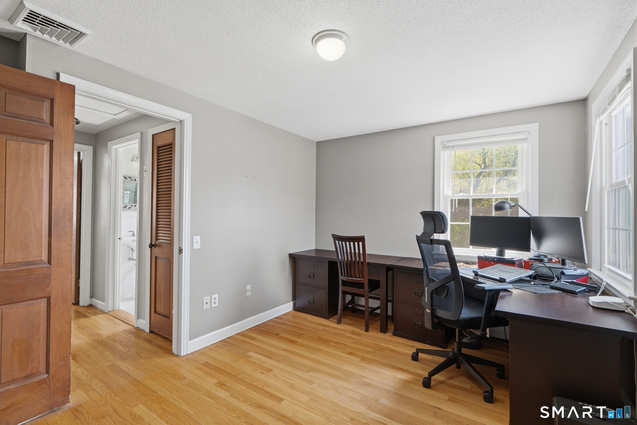 32 Meadowgate Street Wethersfield, CT 06109 - Photo 31 of 40 a workspace with furniture and window