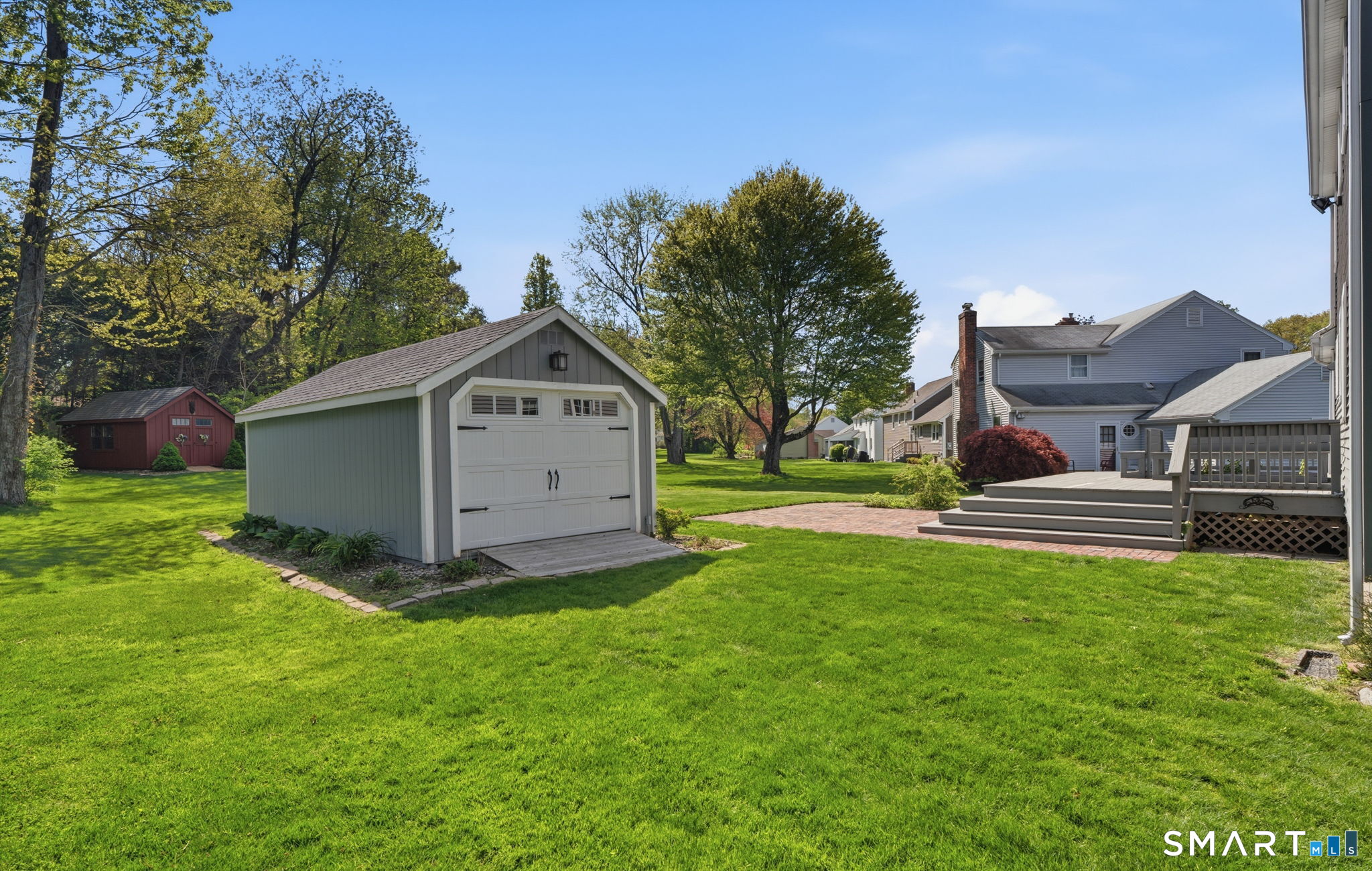 32 Meadowgate Street Wethersfield, CT 06109 - Photo 35 of 40 a front view of house with yard and green space