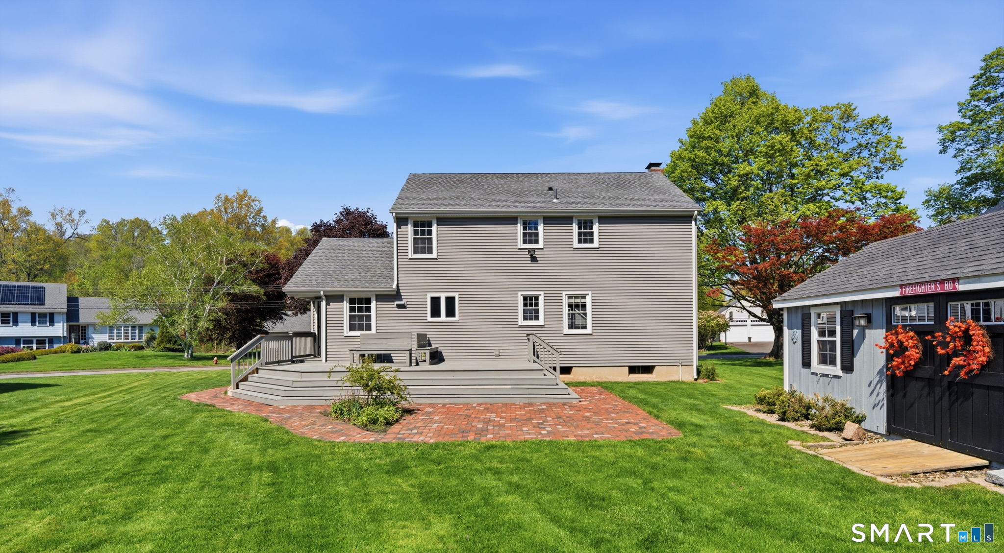 32 Meadowgate Street Wethersfield, CT 06109 - Photo 4 of 40 a front view of house with yard and trees