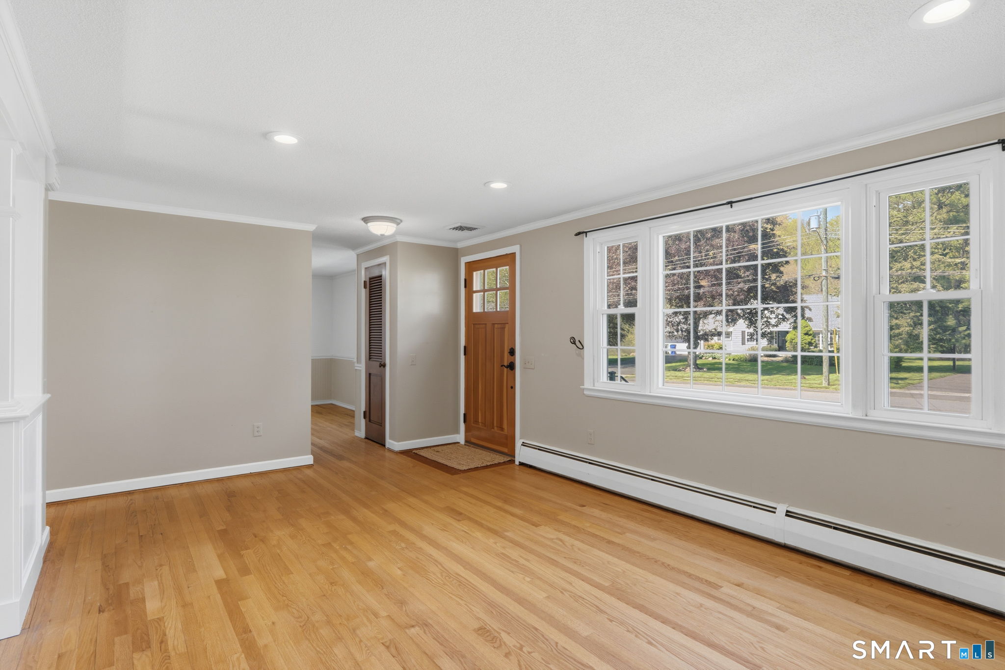 32 Meadowgate Street Wethersfield, CT 06109 - Photo 7 of 40 a view of an empty room with a window