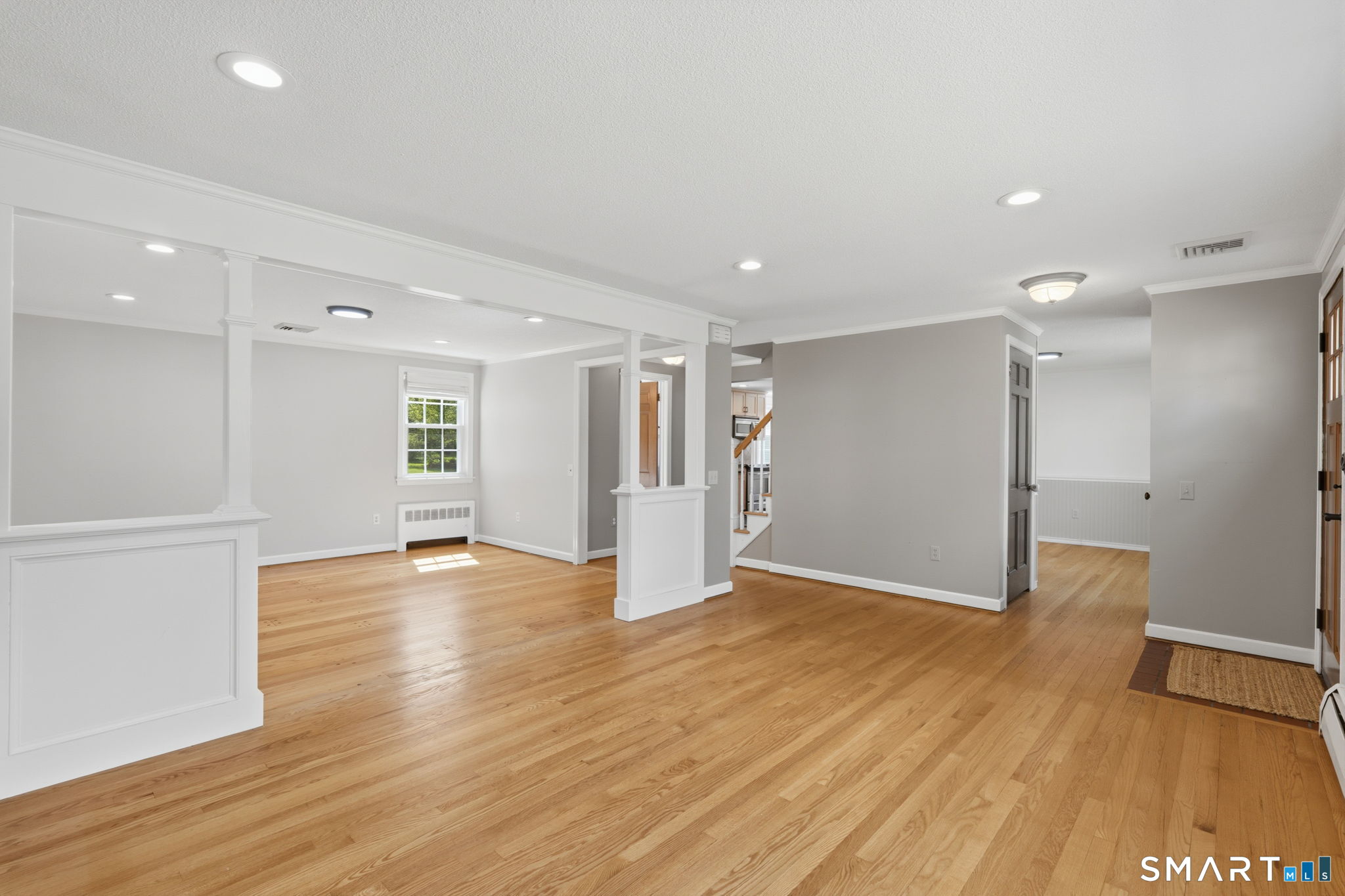 32 Meadowgate Street Wethersfield, CT 06109 - Photo 9 of 40 a view of an empty room with wooden floor