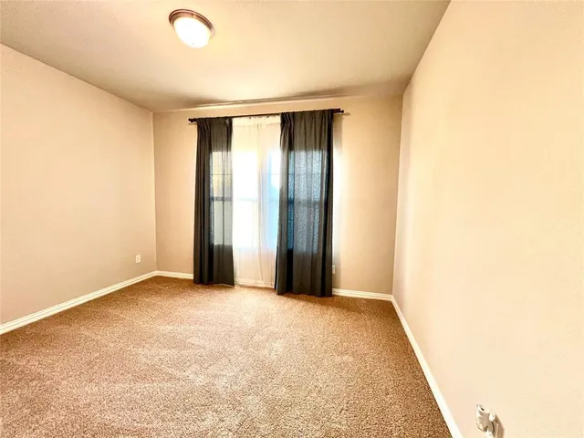 an empty room with window