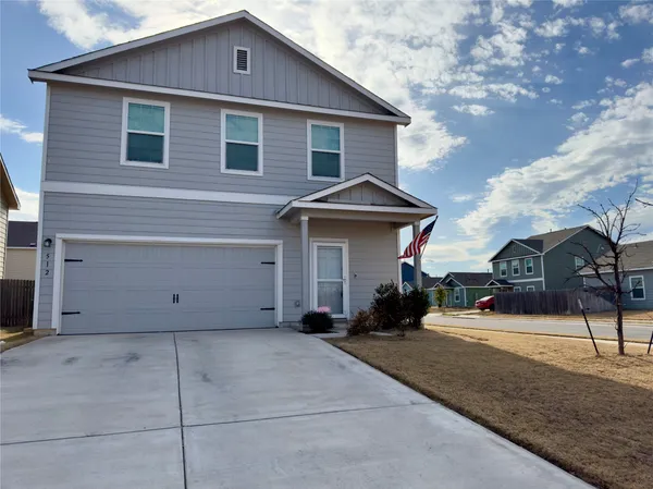 a view of house with outdoor space
