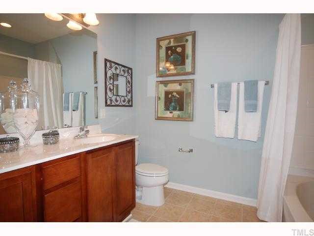537 Weather Ridge Lane Cary, NC 27513 - Photo 11 of 12 Master Bath features Double Vanity Sink, Garden Tub & Linen Closet.