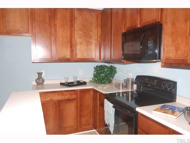 537 Weather Ridge Lane Cary, NC 27513 - Photo 6 of 12 Tall Maple Cabinets, Smooth Top Stove & Microwave are ALL Standard Features!