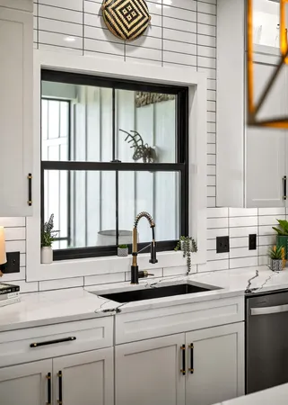a kitchen with a stove and cabinets