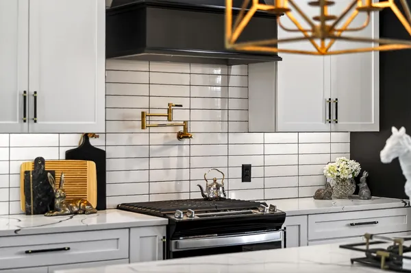 a table with a vase and flowers on it