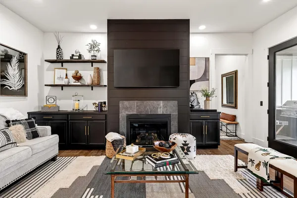 a kitchen with a sink cabinets and a window