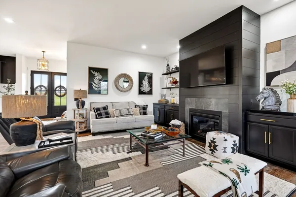 a dining room with furniture window and outside view