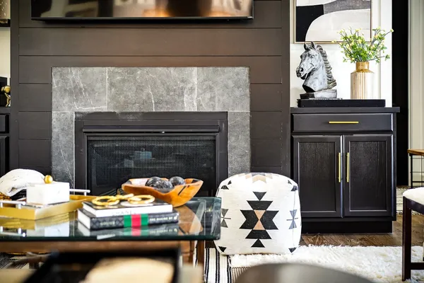 a bedroom with a bed and a couch