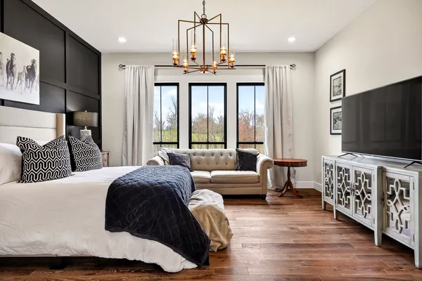 a kitchen with granite countertop stainless steel appliances a stove a sink and a refrigerator