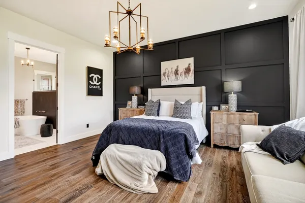 a view of living room with furniture and floor to ceiling window