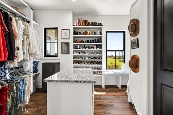 a bedroom with bed and a window