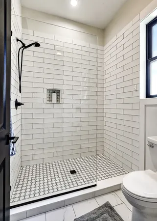 a front view of a house with a yard table and chairs