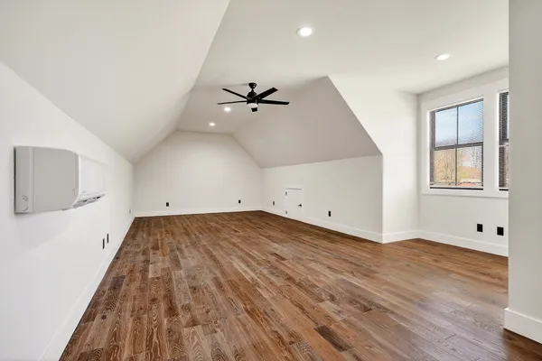 a aerial view of a house with a yard