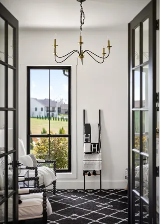 a kitchen with stainless steel appliances kitchen island granite countertop a sink cabinets and wooden floor