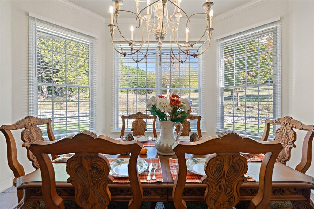 72 Crown Road Willow Park, TX 76087 - Photo 15 of 40 a view of a dining room with furniture window and outside view